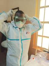 ECP Deus donning PPE