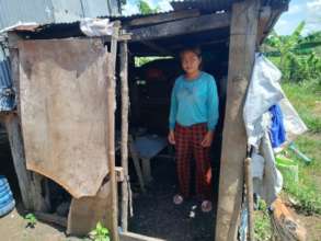 A woman headed household live in the tinned roof