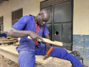 Ajona Working on a model for a Chair