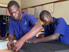 Working a  sofa chair with a fellow student