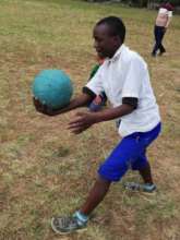 Low vision pupil playing goalbaal