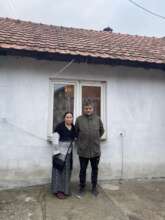 Kenan and his wife at their house