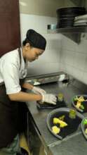 Serly preparing food in the kitchen
