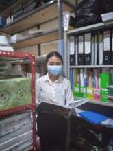 Tina checks the inventory at training place