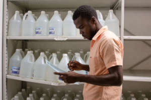 Reviewing SBH's inventory of cleaning supplies.