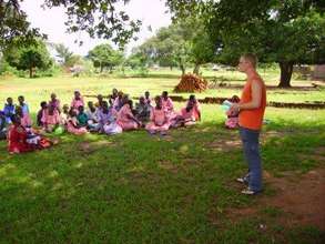 Volunteer sensitizing community on Child Rights