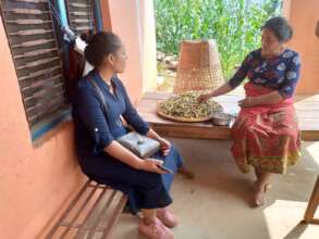 Discussing domestic hygiene, nutrition and crops