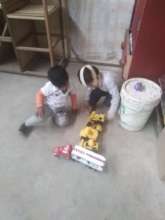 Sebastian playing with his cousin