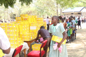 Students receiving new uniforms