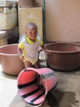 Alason knocks over the dishwashing bucket