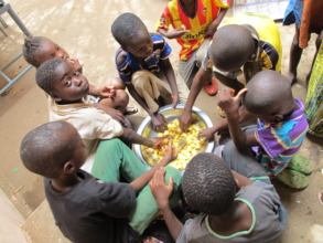 Kids sharing a meal at the clinic