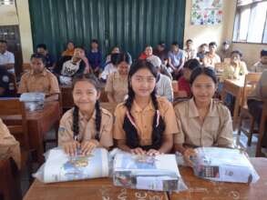 Students with their school supplies