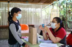 YKIP staff explain the information to student