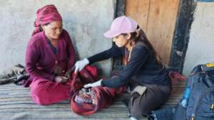 A mother nurturing her baby with PHASE Staff