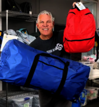 Rob holding loaded Comfort Case and Comfort XL.