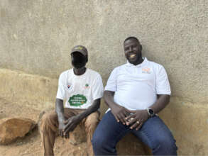 Our Founder with one of the refugees in Palabek