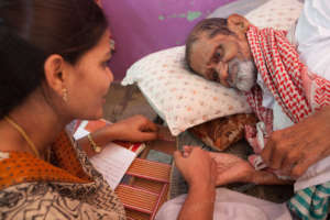 Social worker visiting a patient at home