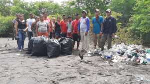 Beach cleanup near macaw habitats