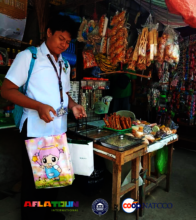 Michael smiles as he prepare his goods for the day