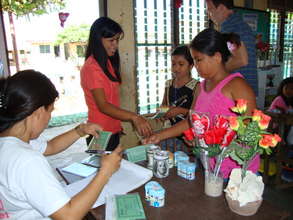 Children depositing to their savings account
