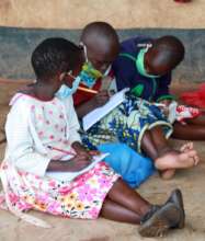 Children attending a learning group in Kenya