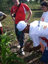 Flor showing ITF traveler Josh irrigation hose