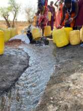 Women Fetching Water at the Borehole