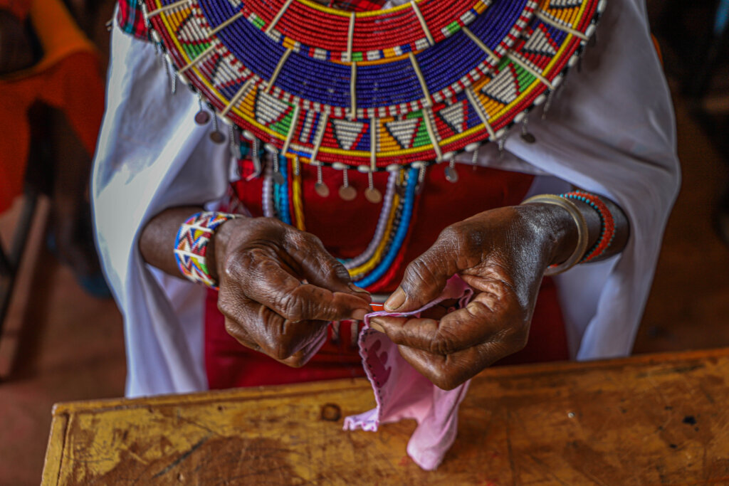 Women training on sanitary pads sewing