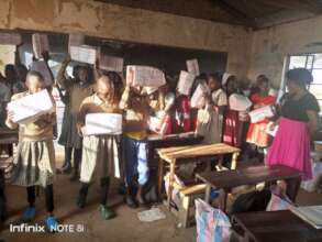 Girls receiving sanitary kits