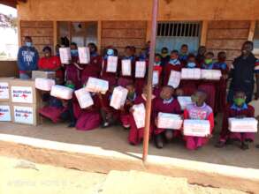 Girls receiving sanitary Kits