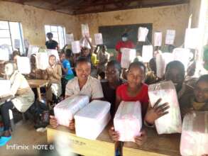 Girls receiving Sanitary Kits