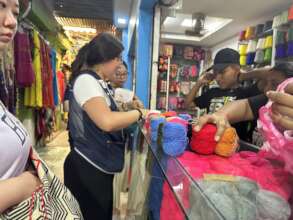 Purchase of threads for weaving