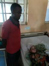 Uzo with his daughter