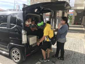 Loading food into van