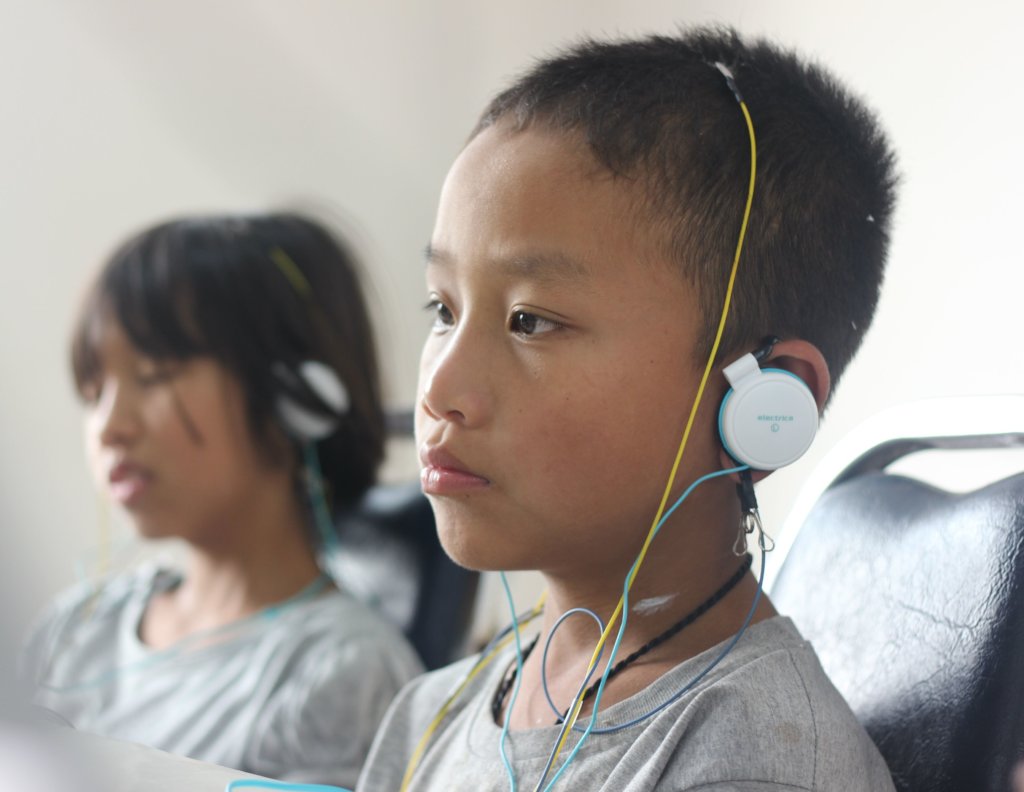 Train 100 hill tribe children to read