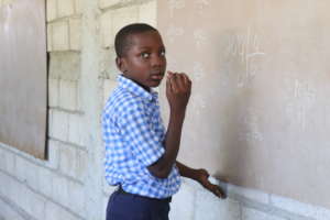 Student at Source Divine  Doing Division