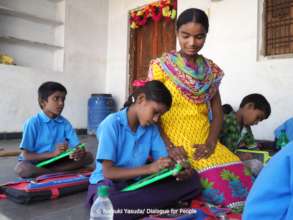 Laxmi, a former bridge school student now teaches