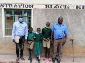 Erick, WE REACH staff, orphans and head teacher Eb