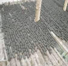 Briquettes drying in the shade