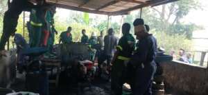Students learnign how to prepare the briquettes