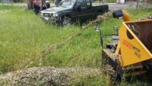 Our woodchipper in action - Stop The Burn project