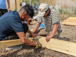 Building raised beds in Because We Carry garden
