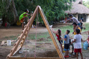 Children helping to build a playground in Mexico