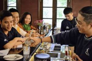 A training session by an expert bartender