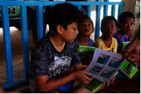 Village youth learning about wildlife