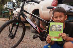 Young student showing off Wildlife Rescue Hotline