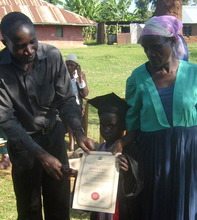 Isaac cogratulating young graduate