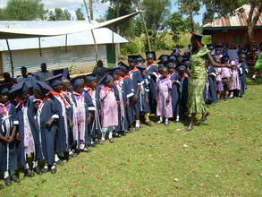 Children from new school graduating