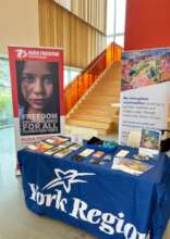 Aura Freedom's display at a community event