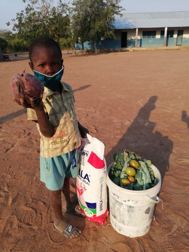 Providing food baskets to students in Mozambique